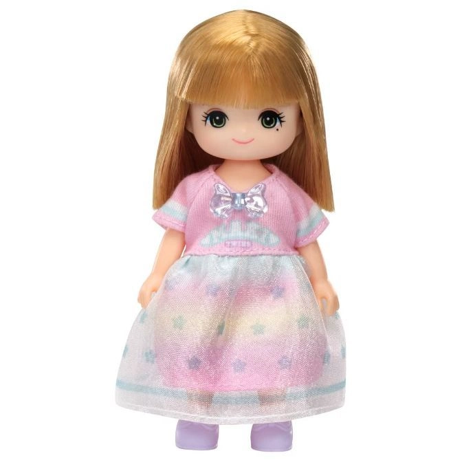 Doll with blonde hair wearing a pink dress with a bow.