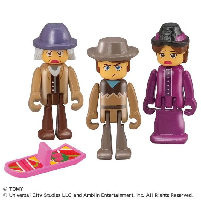  Back to the Future Part III Tomica figures of Doc Brown, Marty McFly, and Clara Clayton, along with Marty's hoverboard.