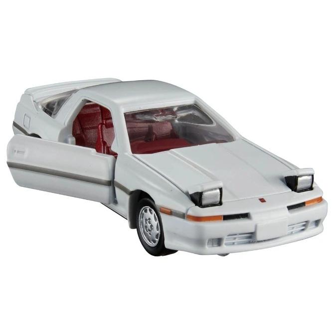  White toy car with open door revealing red interior.