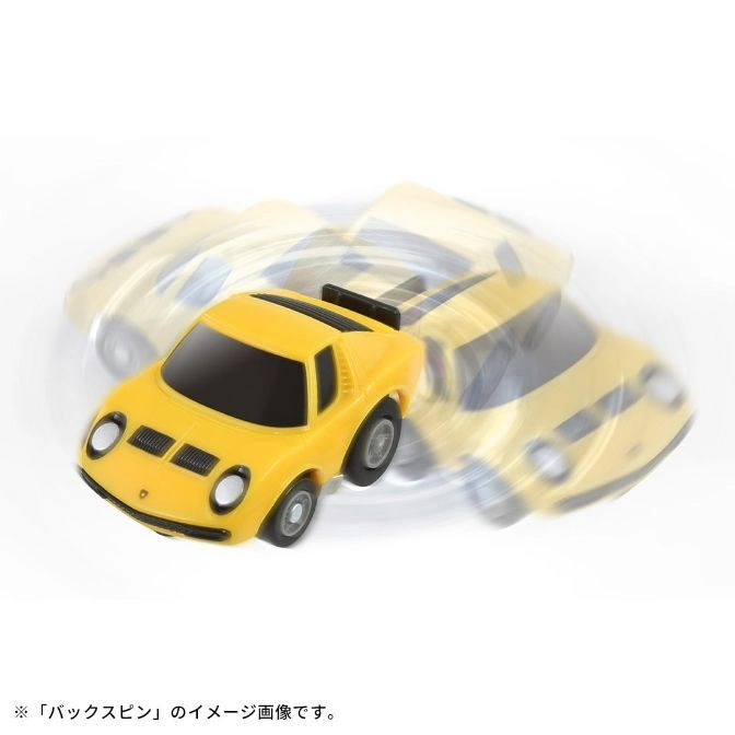  Yellow toy car spinning, featuring a black spoiler and window.
