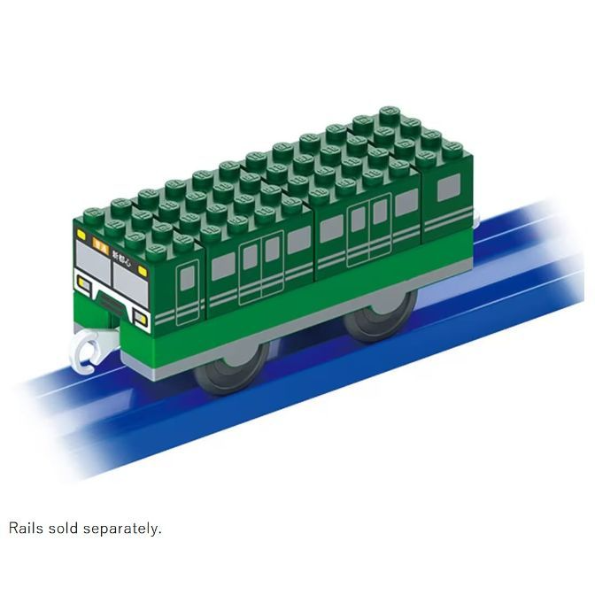  Green toy train made of building blocks on a blue track.