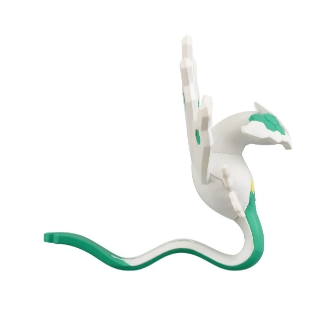  Lugia toy figure with white body, green accents, and a long, curved tail.