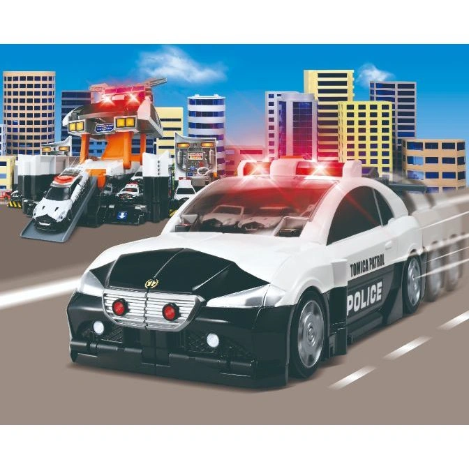  Tomica Patrol car toy speeding past a Tomica police station and city buildings.