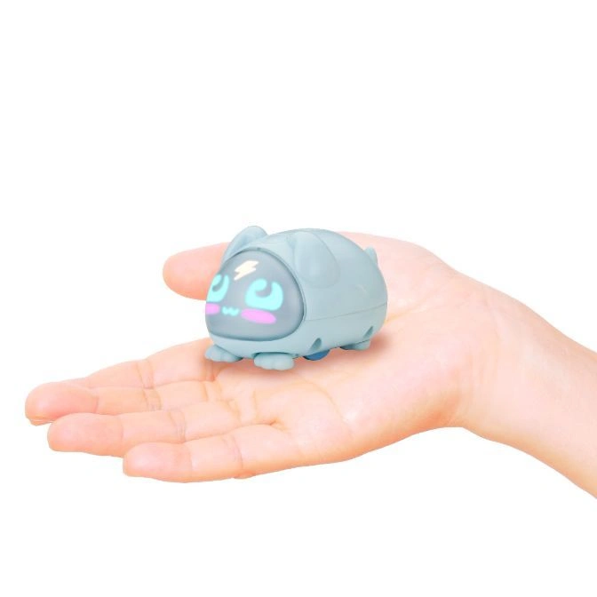 Blue toy robot bunny with a digital face in a hand.
