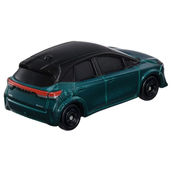  Green toy car with black roof and wheels.