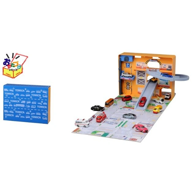 Tomica playset with parking garage, road map, and miniature vehicles.