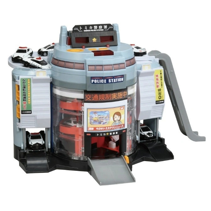  Tomica police station playset with cars, ramps, and Japanese signage.
