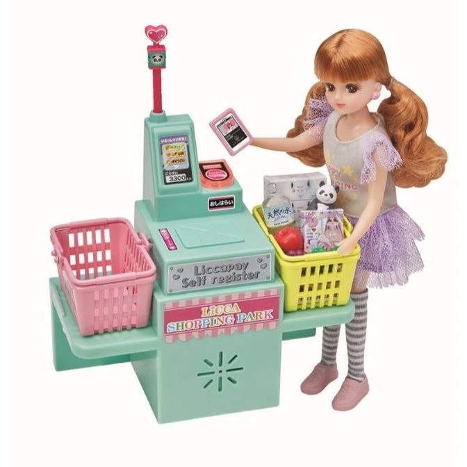  Toy cash register with doll holding a phone, shopping baskets, and toy groceries.