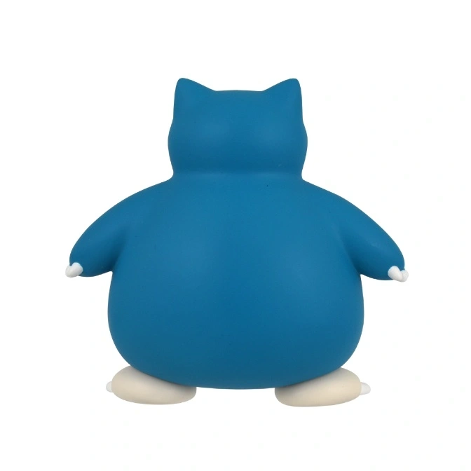  Blue Snorlax toy figure with stubby arms and feet, viewed from the back.