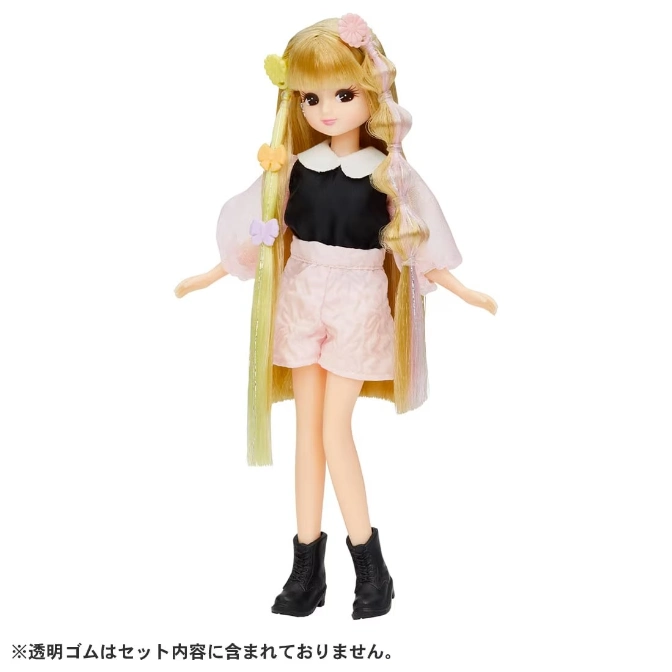  Licca doll with blonde hair, black top, pink shorts, black boots, and flower hair accessories.