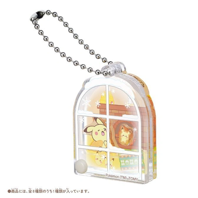 Pokémon window keychain with Pichu, fireplace, and snowflakes.