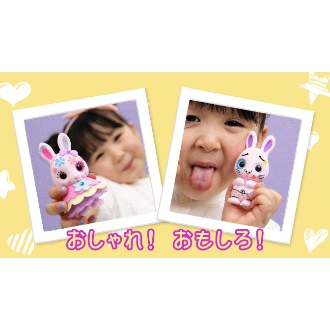  Two toy bunnies held by kids. One bunny wears a dress, the other has silly face details.