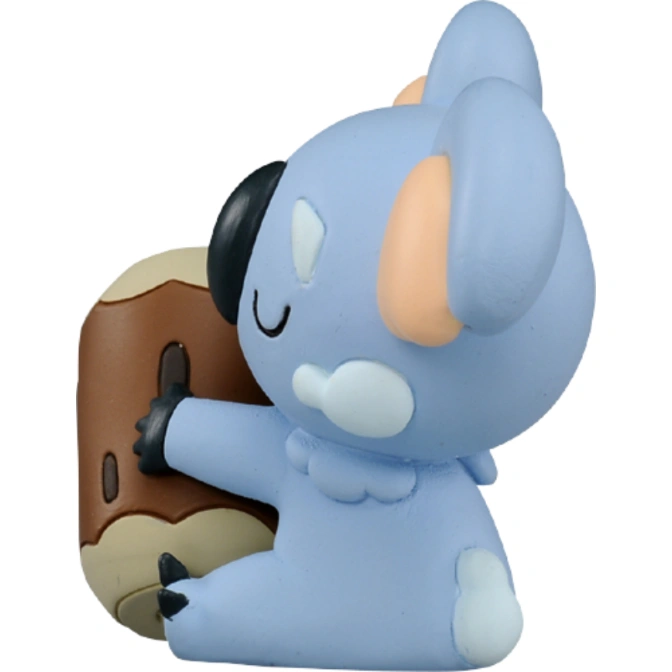  Koala Pokémon toy figure hugging a log, light blue with peach ears and black nose.