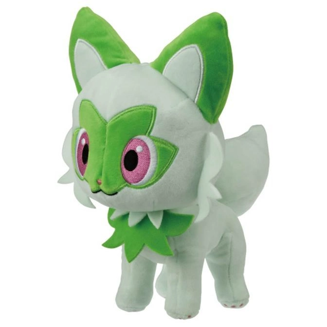  Sprigatito plush toy with green and white fur, pink eyes, and leaf-shaped accents.
