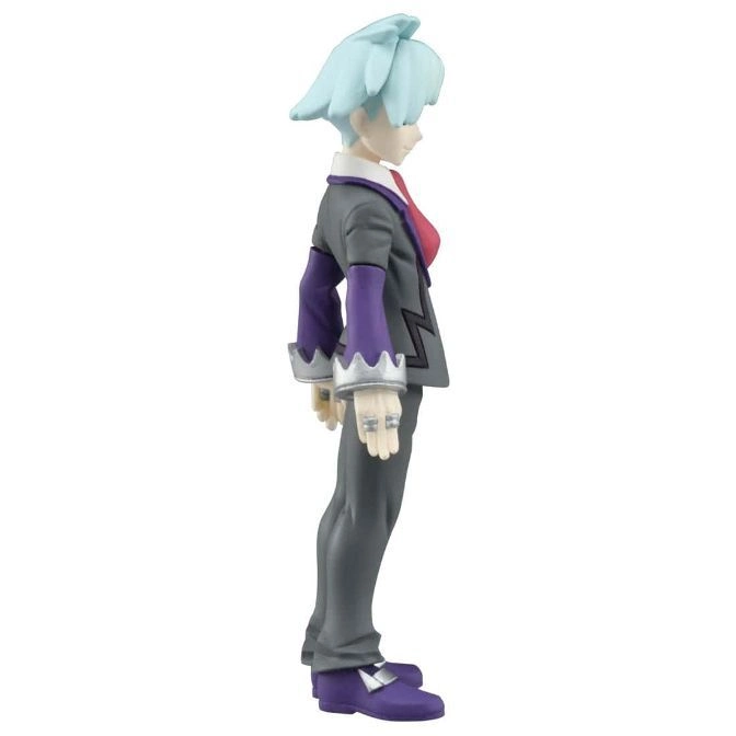  Grimsley Pokémon figure with light blue hair, wearing a grey suit and purple shoes.