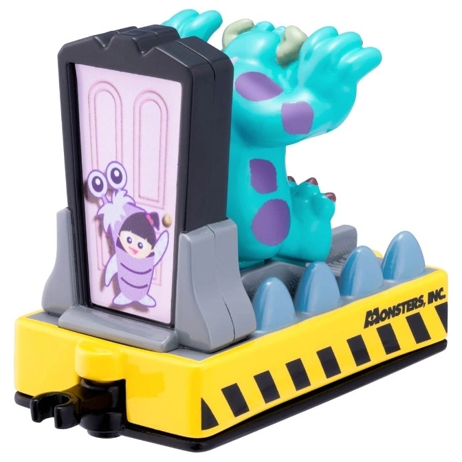  Monsters, Inc. toy featuring Sully, Boo's door, and a yellow hazard-striped base.