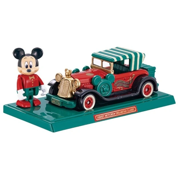 Mickey Mouse toy car: red vintage car with green accents and a Mickey Mouse figurine on a green base.