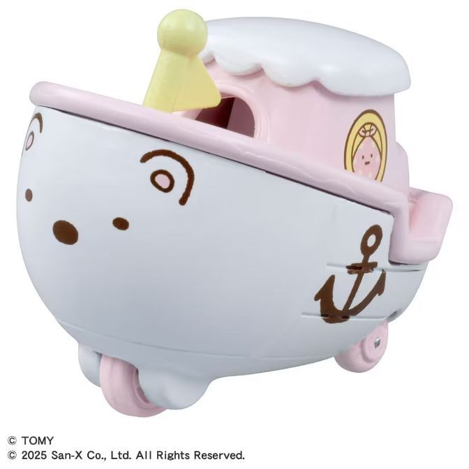 Pink and white toy boat with anchor, face details, and wheels.