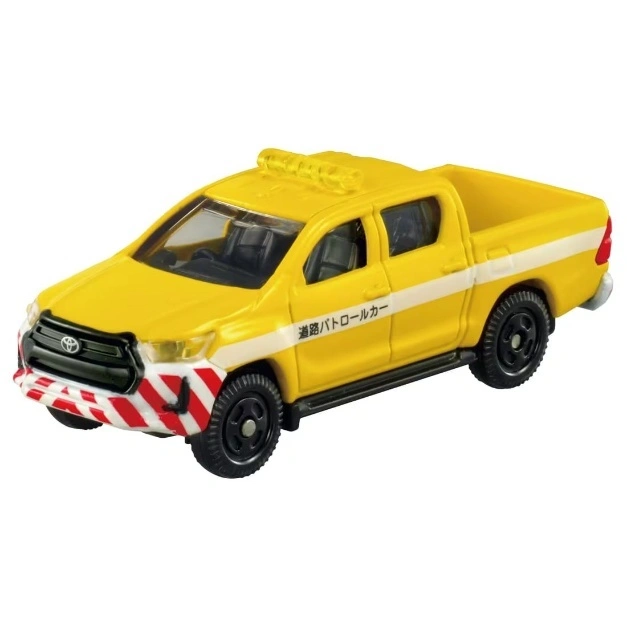  Yellow toy Toyota Hilux patrol truck with red and white striped bumper and light bar.