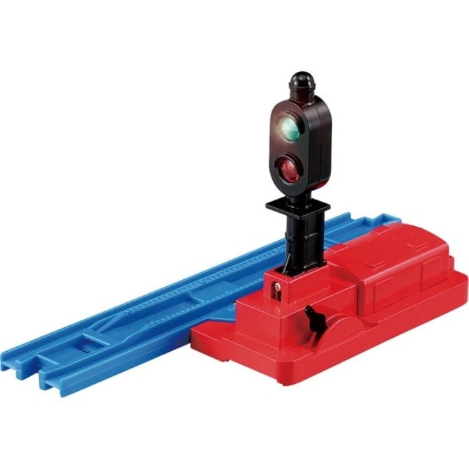 Toy train track signal with green light, red base, and blue track.