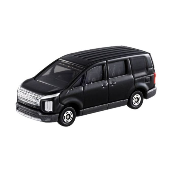 Black toy minivan with detailed grille and wheels.