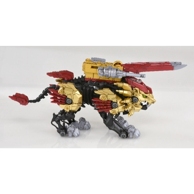  Gold Zoid Liger toy with red accents and a large cannon on its back.