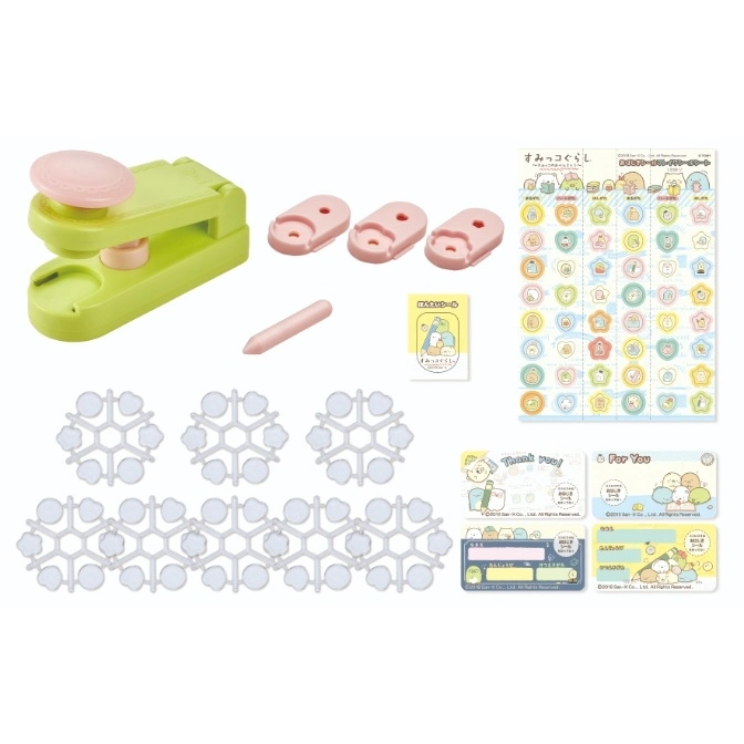 Sumikko Gurashi toy set with a green stamper, pink stamp pads, stickers, and snowflake-shaped molds.