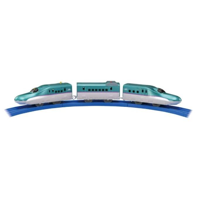  A toy train on a blue track.