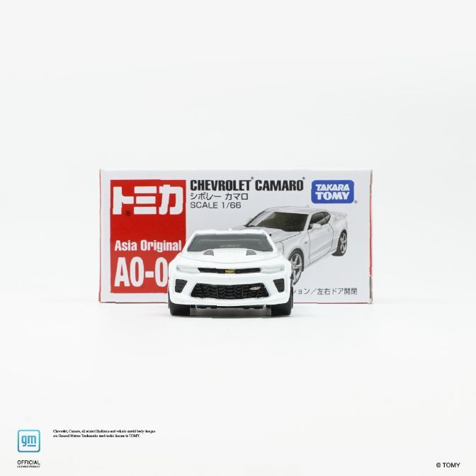  White Tomica Chevrolet Camaro toy car with original packaging, scale 1/66.