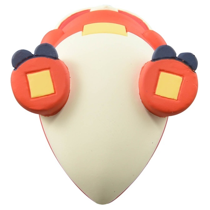 Red and white toy with headphones and yellow square details.