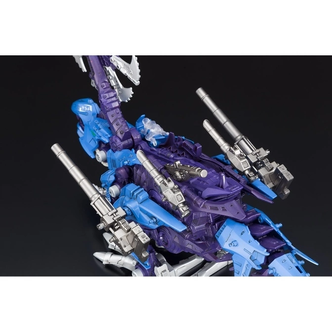  Purple and blue scorpion robot toy with silver cannons and claws.