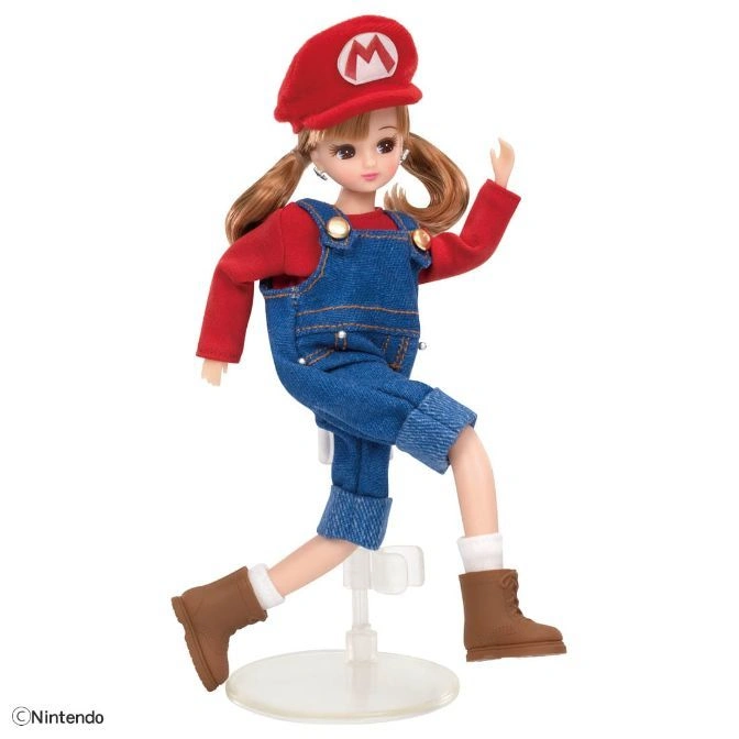  Mario-themed Licca doll in overalls and cap, posed mid-stride on a stand.