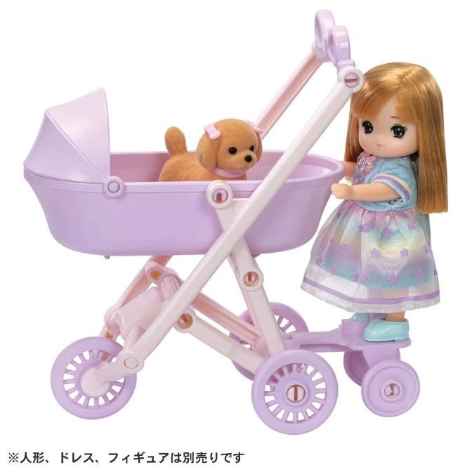  Toy pram with doll and plush dog. Pram is lavender and white.