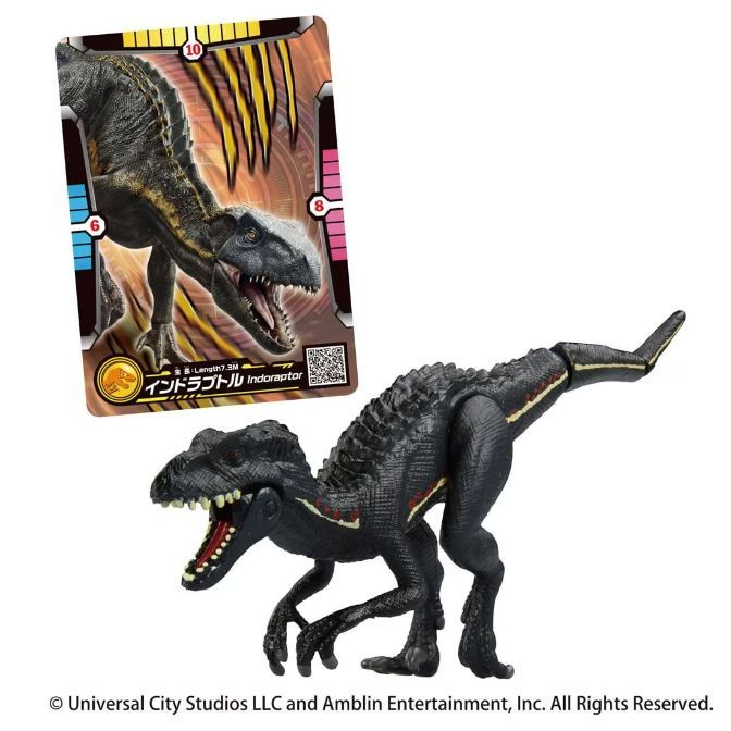 Black Indoraptor toy with card. The toy has red and yellow stripes.