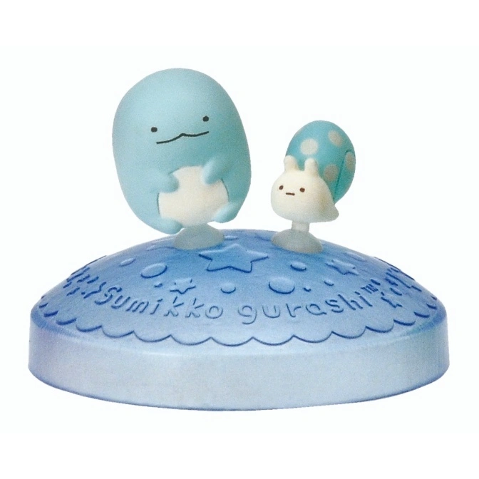  Sumikko Gurashi figurine with blue blob character and snail on a patterned base.