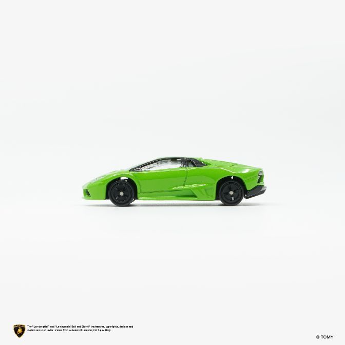  Green toy Lamborghini car, side view, black wheels, sleek design.