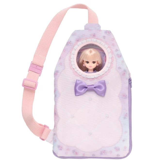  Lilac doll carrier backpack with doll visible through a round window, featuring a bow and adjustable strap.