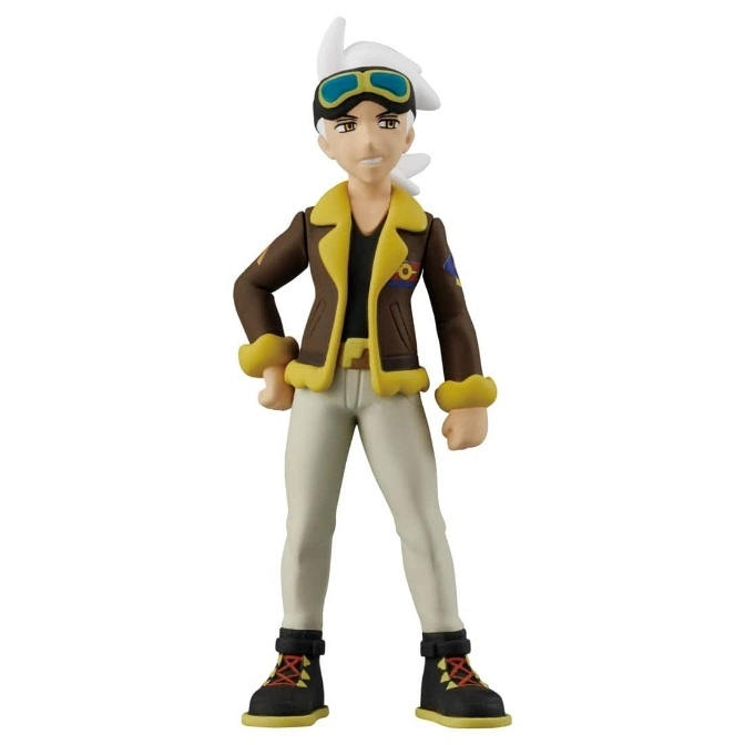  Pokemon character toy with goggles, brown jacket, and tan pants standing.