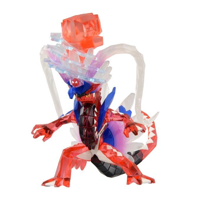 Koraidon Tera Crystal Pokémon toy figure, red and blue, with crystal details and a large crystal on top.
