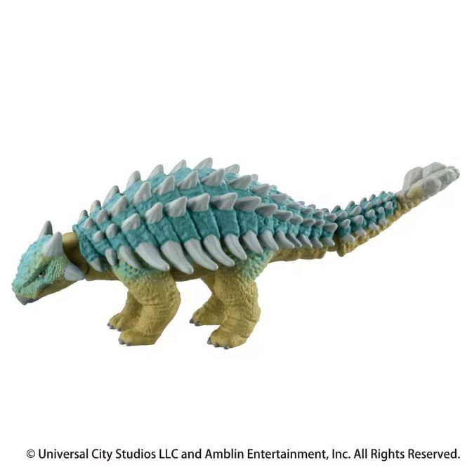  Blue and yellow Ankylosaurus toy with white spikes.