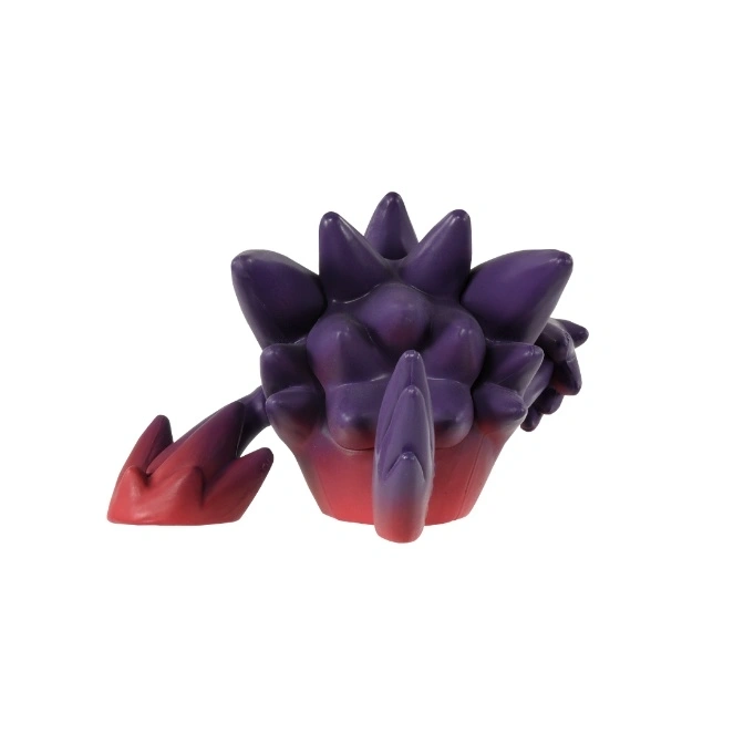  Purple toy with spikes and red accents.