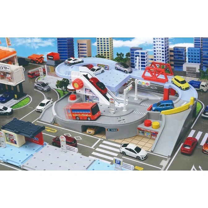Tomica toy city playset with cars, buildings, and roads, showcasing a miniature urban environment.