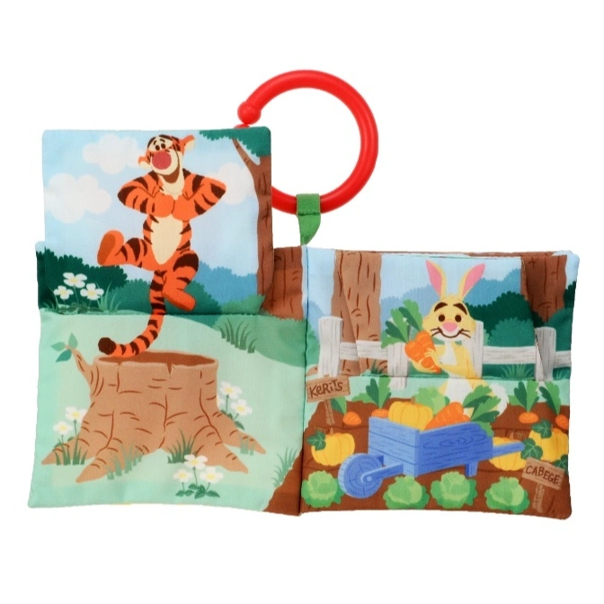  Winnie the Pooh soft book with Tigger and Rabbit illustrations, featuring a red teether ring.
