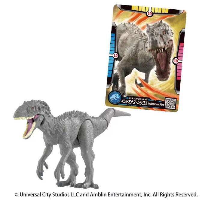 Indominus Rex toy and card. The toy is grey, posed roaring. The card features the same dinosaur.