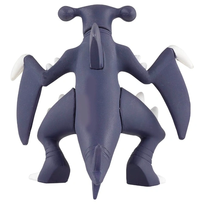  Dark blue Garchomp toy figure with white accents, viewed from the back.