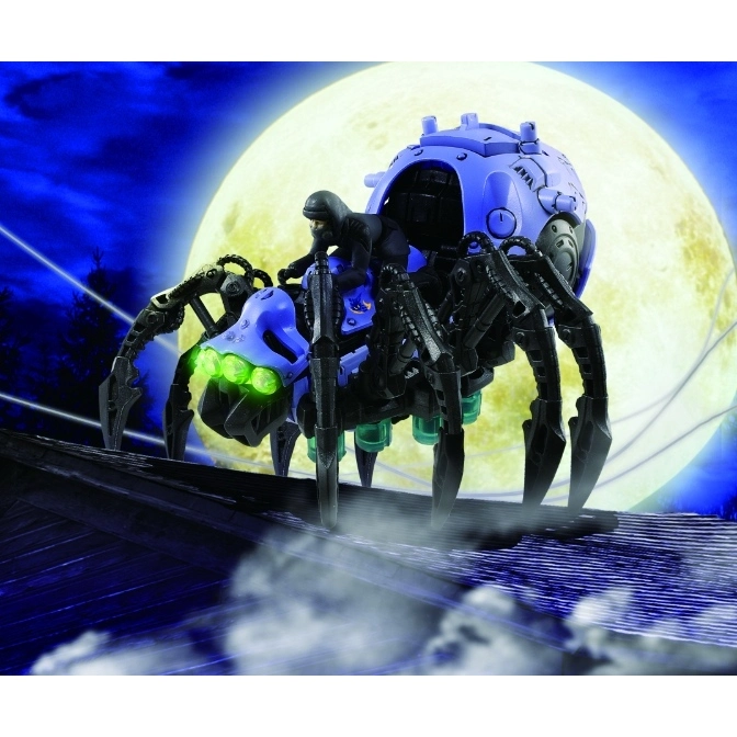  Blue spider toy with a rider, glowing green eyes, and a large moon in the background.