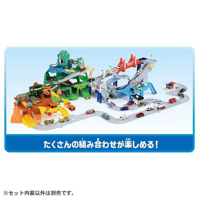  Toy car playset with multiple levels, ramps, and vehicles on a blue background.