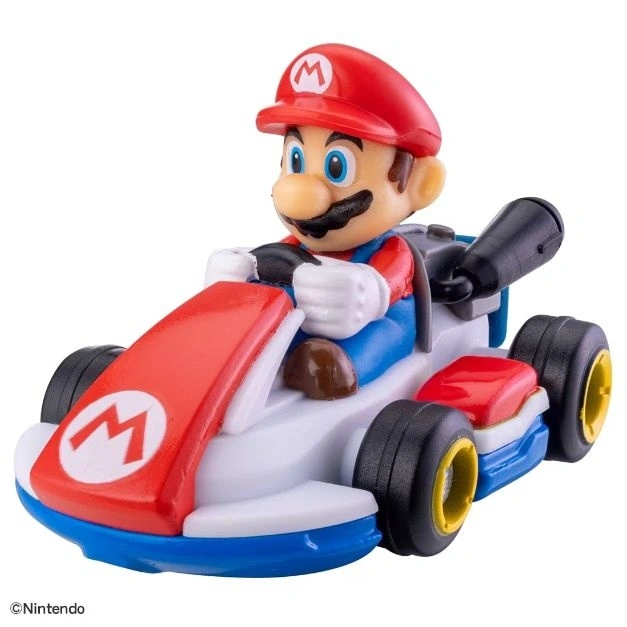  Mario in a kart toy. Red hat, blue overalls, white kart with red and blue accents, black tires.