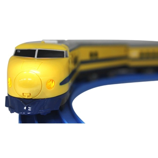  Yellow toy bullet train on a blue track. Headlights are on.