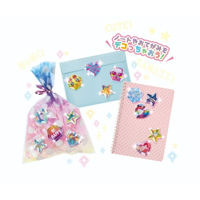 Sticker set with a bag, envelope, and notebook decorated with gem-like stickers.